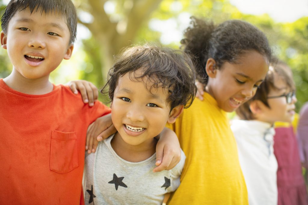 group of young kids gathered together at school