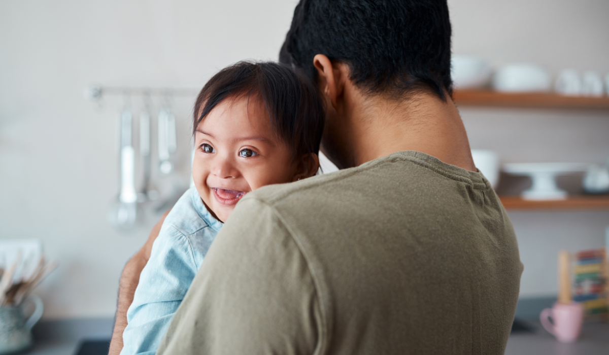 Vietnamese dad with child who has Down syndrome